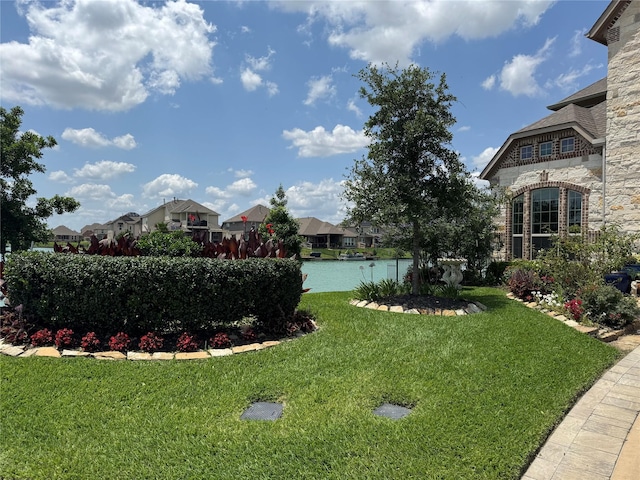 24130 Cannon Anello Ct, Katy, TX 77493 - view of grassy yard featuring a residential view and a water view