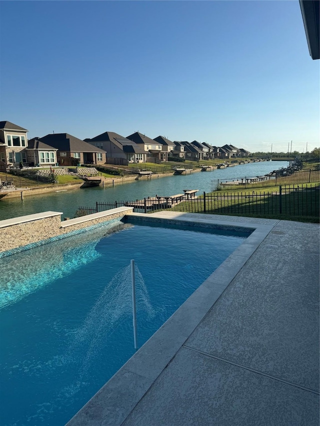 24130 Cannon Anello Ct, Katy, TX 77493 - view of swimming pool featuring a water view and a residential view
