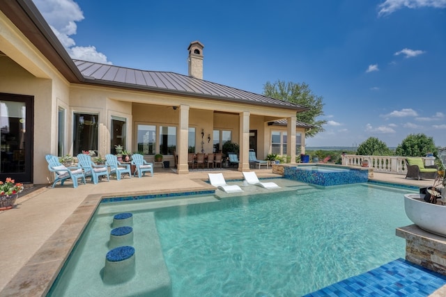 143 Westgate Loop, Horseshoe Bay, TX 78657 - view of swimming pool featuring a patio and a pool with connected hot tub