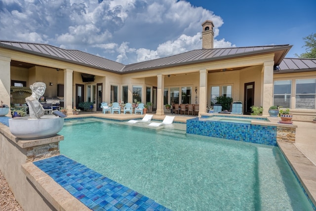 143 Westgate Loop, Horseshoe Bay, TX 78657 - view of pool with a patio area, outdoor dining area, and a pool with connected hot tub