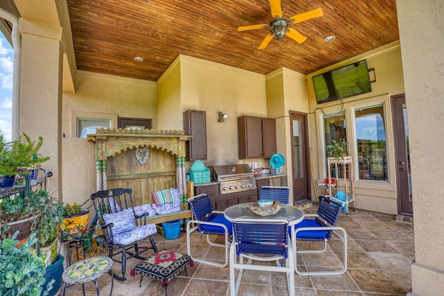 143 Westgate Loop, Horseshoe Bay, TX 78657 - view of patio with a grill, area for grilling, a ceiling fan, and outdoor dining space