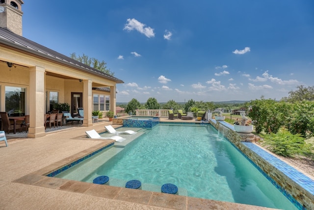 143 Westgate Loop, Horseshoe Bay, TX 78657 - view of swimming pool with a patio area and a pool with connected hot tub