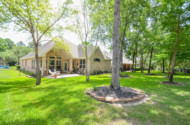 1523 Cafe Dumonde, Conroe, TX 77304 - rear view of house with brick siding, ceiling fan, and a patio