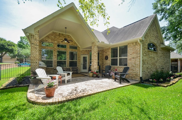 1523 Cafe Dumonde, Conroe, TX 77304 - back of property featuring ceiling fan, brick siding, a patio, and a shingled roof