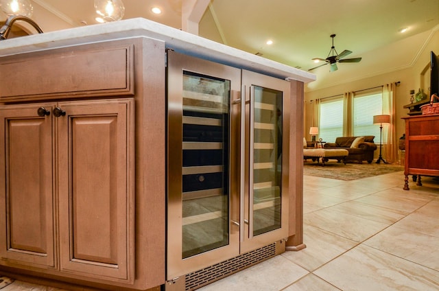 1523 Cafe Dumonde, Conroe, TX 77304 - detailed view of wine cooler, ornamental molding, ceiling fan, and recessed lighting