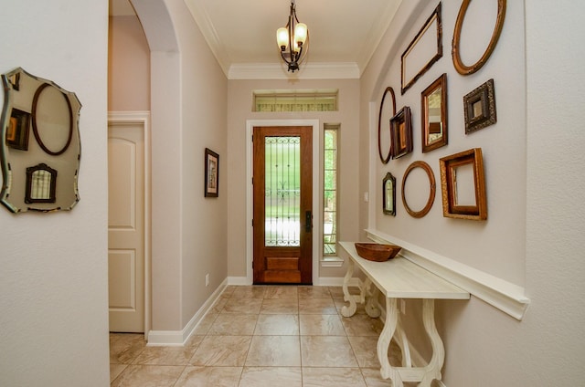 1523 Cafe Dumonde, Conroe, TX 77304 - foyer entrance with ornamental molding, arched walkways, light marble finish flooring, and baseboards