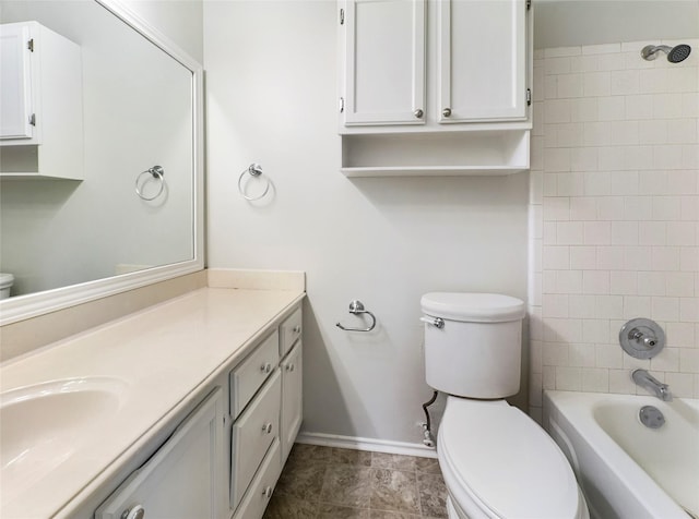 1409 Roosevelt Dr, Deer Park, TX 77536 - full bath featuring toilet, vanity, baseboards, and shower / washtub combination