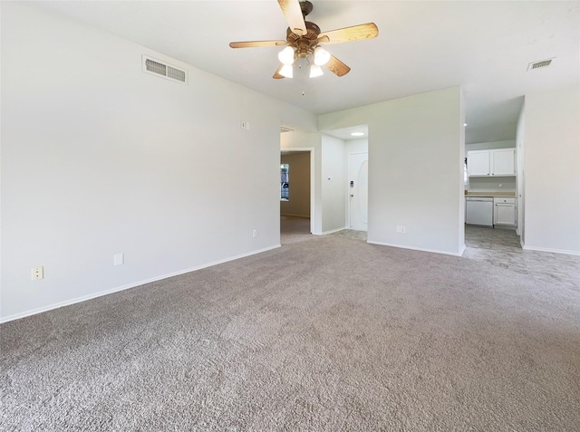 1409 Roosevelt Dr, Deer Park, TX 77536 - empty room with light carpet, ceiling fan, and baseboards