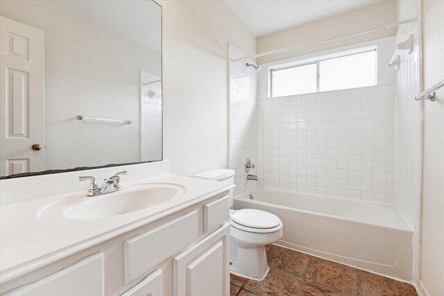 15027 Moss Bridge Ln, Sugar Land, TX 77498 - bathroom with toilet, vanity, bathing tub / shower combination, and tile patterned floors