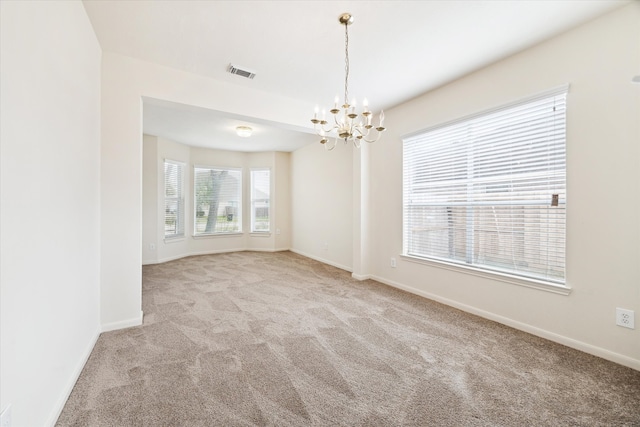 15027 Moss Bridge Ln, Sugar Land, TX 77498 - unfurnished room with carpet flooring, a chandelier, and baseboards