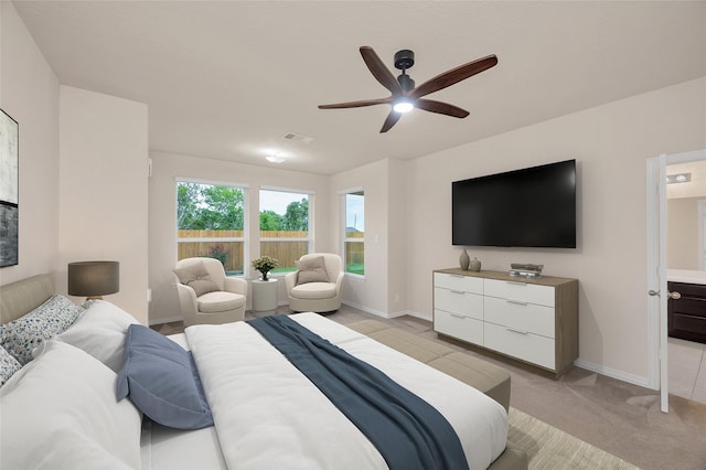 bedroom featuring baseboards and a ceiling fan
