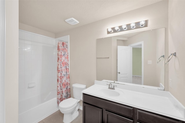 full bathroom with toilet, vanity, tile patterned floors, and shower / tub combo with curtain