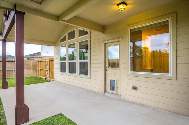view of patio featuring fence