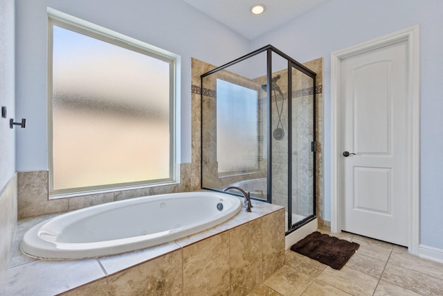 19107 Egret Glen Ct, Cypress, TX 77429 - full bath with a shower stall, a garden tub, and tile patterned floors