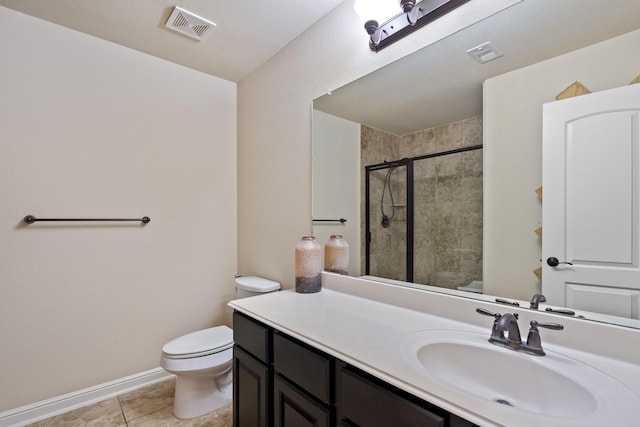 19107 Egret Glen Ct, Cypress, TX 77429 - bathroom with toilet, tiled shower, vanity, tile patterned floors, and baseboards