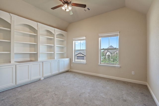 19107 Egret Glen Ct, Cypress, TX 77429 - unfurnished room with lofted ceiling, light colored carpet, a ceiling fan, and baseboards