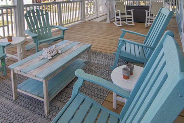 13731 Mutiny Ln, Galveston, TX 77554 - wooden deck with outdoor dining space