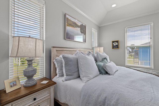 13731 Mutiny Ln, Galveston, TX 77554 - bedroom featuring multiple windows, lofted ceiling, and ornamental molding