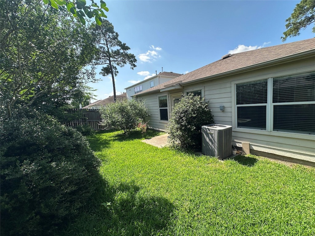 710 Cypresswood Rdg, Spring, TX 77373 - view of yard with central AC unit