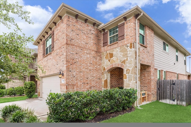 7110 Poppyseed Trl, Spring, TX 77379 - view of front of property featuring brick siding, an attached garage, fence, and concrete driveway