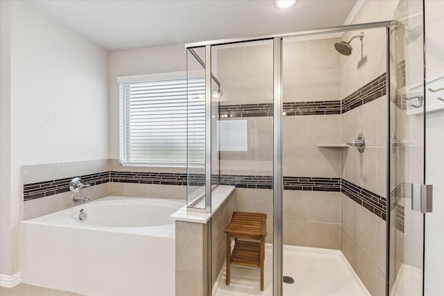 7110 Poppyseed Trl, Spring, TX 77379 - bathroom featuring a stall shower, a garden tub, and recessed lighting