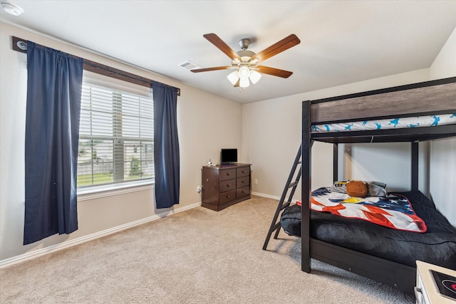 7110 Poppyseed Trl, Spring, TX 77379 - carpeted bedroom with baseboards and ceiling fan