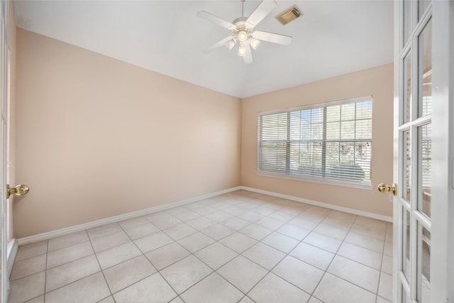 14402 Eastern Redbud Ln, Houston, TX 77044 - empty room with baseboards, a ceiling fan, and light tile patterned floors
