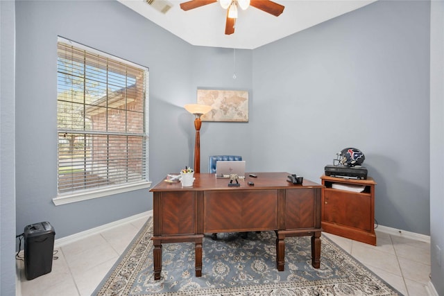 14402 Eastern Redbud Ln, Houston, TX 77044 - office with a ceiling fan, plenty of natural light, tile patterned flooring, and baseboards