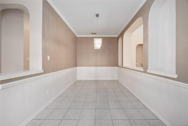 14402 Eastern Redbud Ln, Houston, TX 77044 - unfurnished room featuring crown molding and light tile patterned floors
