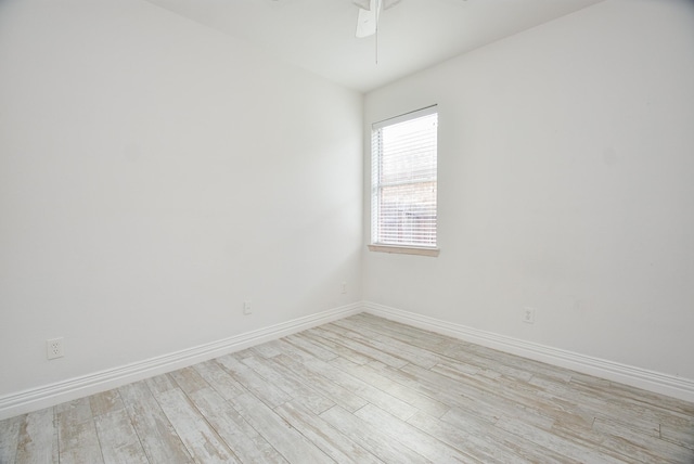 1049 Misty Clf, Dickinson, TX 77539 - unfurnished room featuring light wood-type flooring, baseboards, and a ceiling fan
