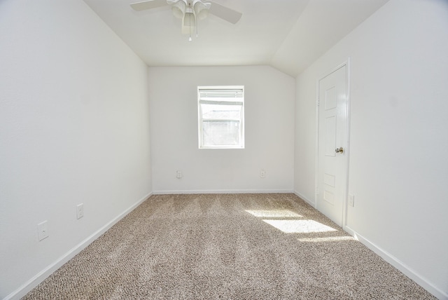 1049 Misty Clf, Dickinson, TX 77539 - empty room with carpet floors, vaulted ceiling, ceiling fan, and baseboards