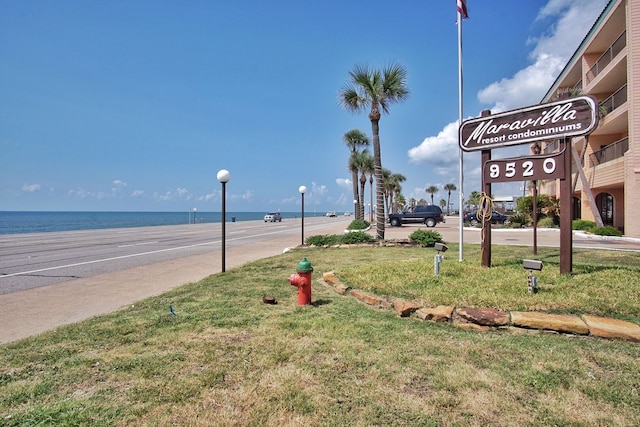 9520 Seawall Blvd Unit 235, Galveston, TX 77554 - view of home's community featuring a water view and a yard