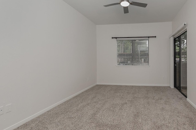 3500 Tangle Brush Dr Unit 217, The Woodlands, TX 77381 - carpeted empty room with ceiling fan and baseboards
