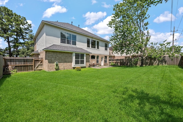 back of house featuring brick siding and a shingled roof