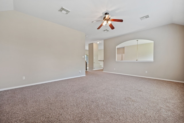 unfurnished room with a ceiling fan, lofted ceiling, carpet flooring, and baseboards
