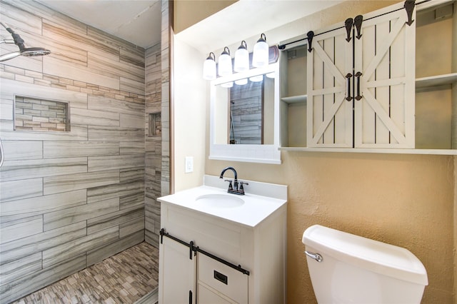 3711 Clover Meadows St, Pasadena, TX 77505 - bathroom with a tile shower, vanity, and toilet