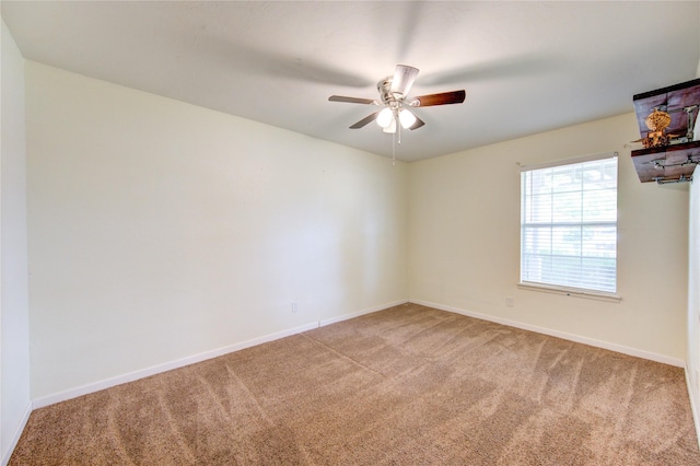 3711 Clover Meadows St, Pasadena, TX 77505 - carpeted empty room with baseboards and a ceiling fan