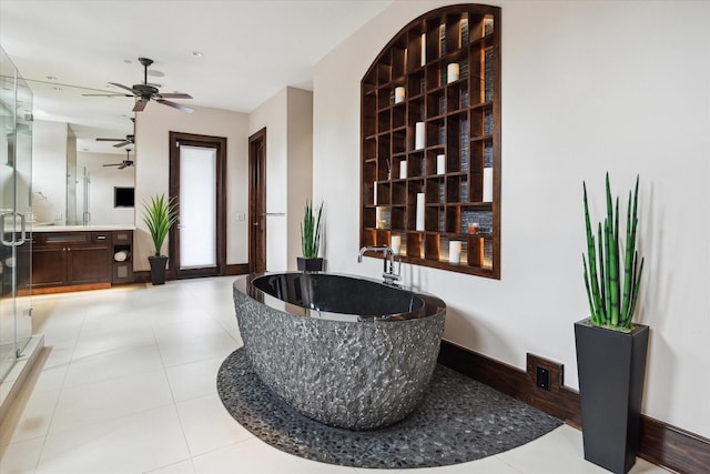 detailed view of ceiling fan and baseboards