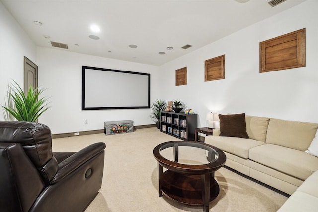 carpeted home theater with baseboards and recessed lighting