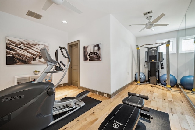workout room featuring ceiling fan, wood-type flooring, recessed lighting, and baseboards
