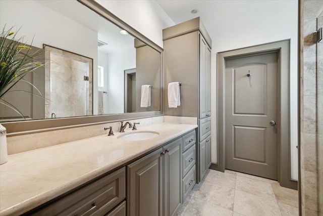 full bathroom featuring vanity and a shower with door