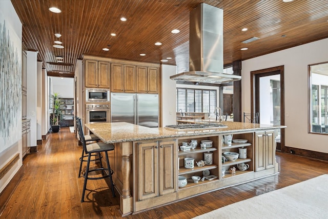 kitchen with built in appliances, island range hood, open shelves, recessed lighting, and baseboards