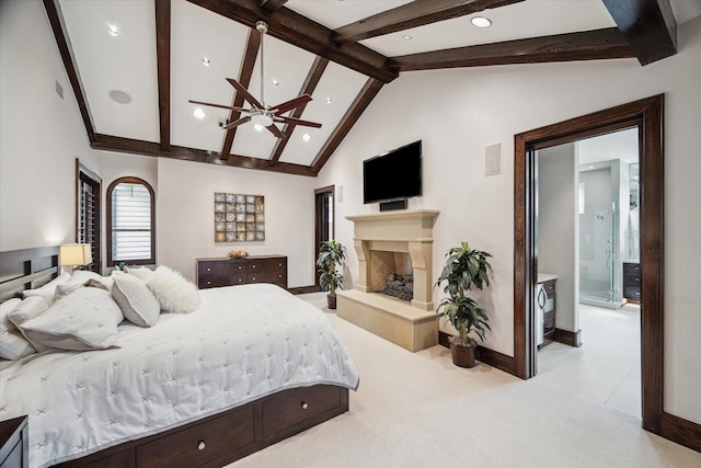 bedroom featuring baseboards, recessed lighting, a fireplace with raised hearth, and light colored carpet