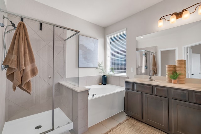9962 Ash Creek Ct, Brookshire, TX 77423 - bathroom featuring a shower stall, a garden tub, double vanity, and tile patterned flooring