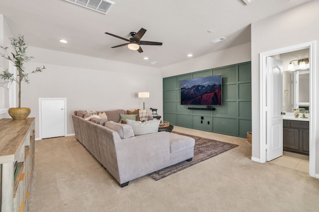 9962 Ash Creek Ct, Brookshire, TX 77423 - living area with light colored carpet, ceiling fan, and recessed lighting