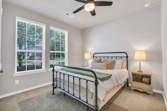 9962 Ash Creek Ct, Brookshire, TX 77423 - bedroom with carpet, baseboards, and ceiling fan