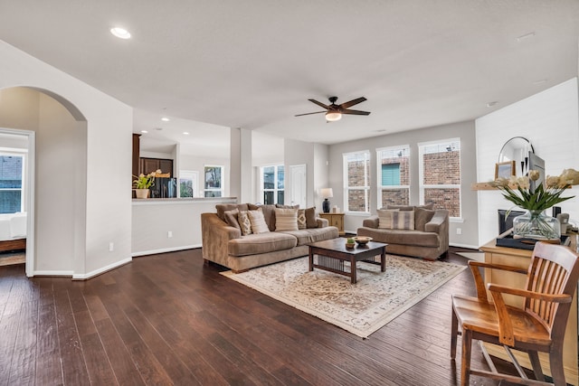 9962 Ash Creek Ct, Brookshire, TX 77423 - living room with arched walkways, ceiling fan, baseboards, dark wood-style floors, and recessed lighting