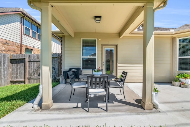 9962 Ash Creek Ct, Brookshire, TX 77423 - view of patio with fence and outdoor dining space