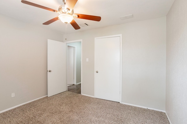 5935 Caruso Forest Dr, Houston, TX 77088 - spare room featuring carpet, ceiling fan, and baseboards