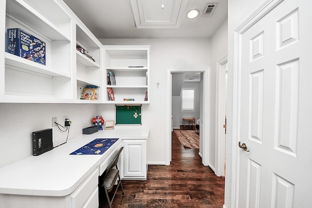 office area featuring built in study area and dark wood finished floors